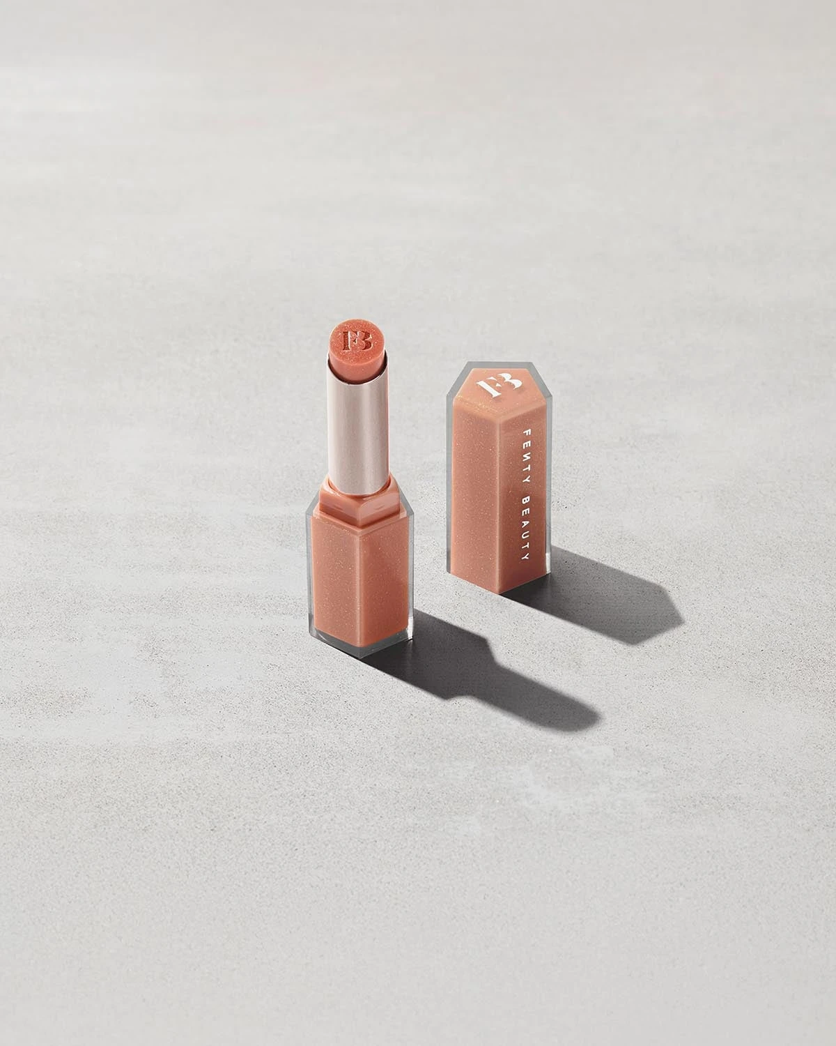 Gloss Bomb Stix High-Shine Gloss Stick — Shimmering Fenty Glow 1 Gloss Bomb Stix High-Shine Gloss Stick — Shimmering Fenty Glow